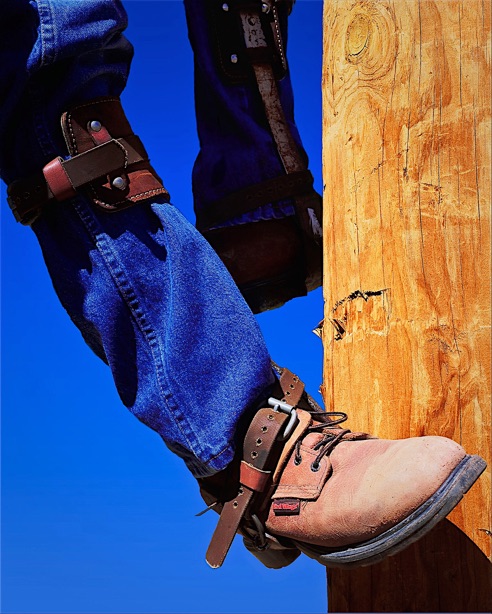 commercial corporate industrial photography lineman climbing telephone pole
