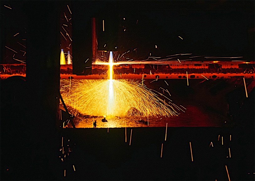commercial corporate industrial photography steel being cut in a steel mill